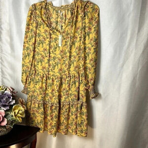 Ruffle,tiered,floral,frill dress,shirring cuffs,tie front,wood accent,keyhole